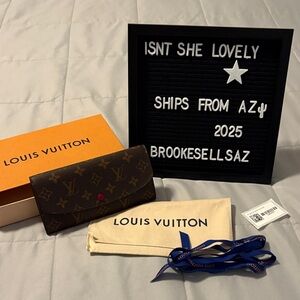 Louis Vuitton Classic Monogram/Fuschia Emilie wallet. Great used condition.